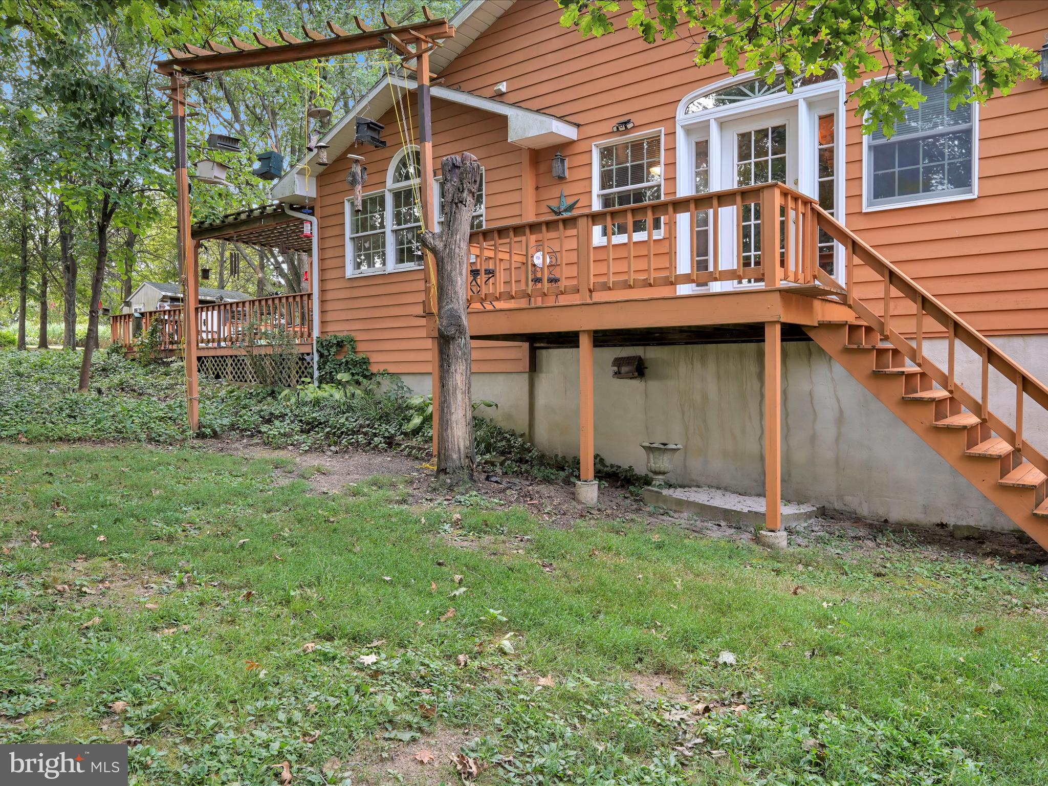 321 Wolf Creek Road Bernville, PA 19506 - Photo 7 of 49 a view of a house with a yard and sitting area