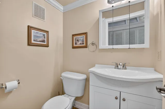 a bed room with a bed and a television