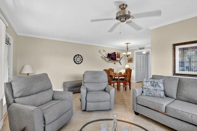a living room with furniture and a couch