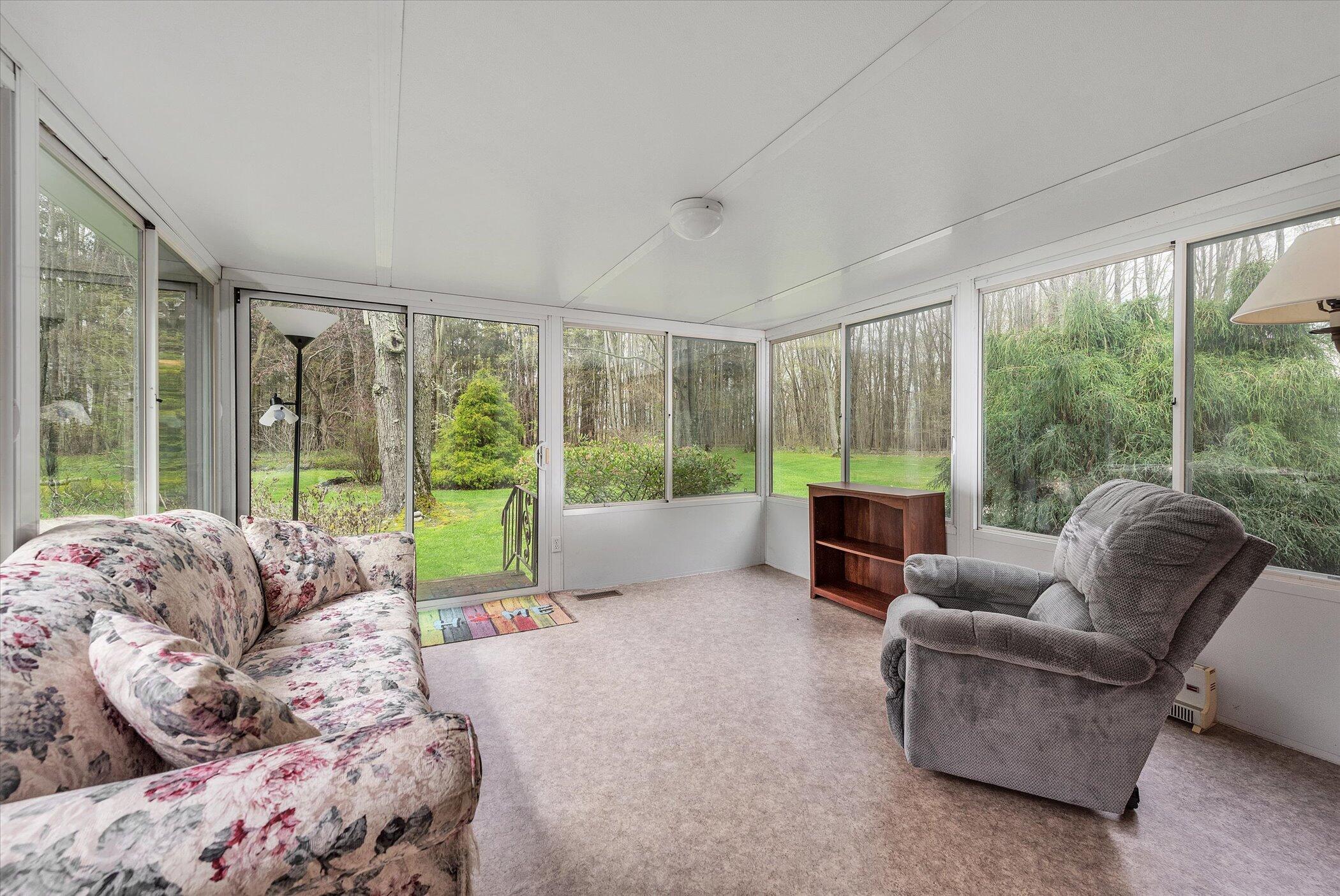 49444 Rush Lake Road Hartford, MI 49057 - Photo 18 of 54 Heated Sun Porch