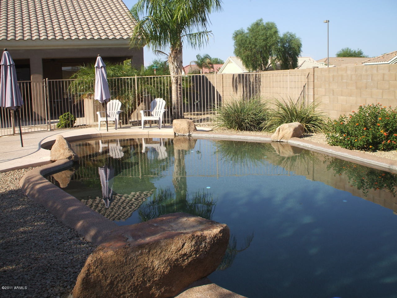 13171 West Granada Road Goodyear, AZ 85395 - Photo 1 of 6 PEBBLE-TEC PLAY POOL
