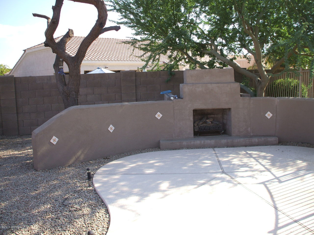 13171 West Granada Road Goodyear, AZ 85395 - Photo 2 of 6 OUTSIDE FIREPLACE