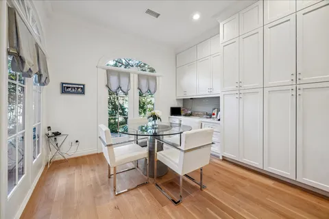 a bathroom with a sink toilet and a mirror