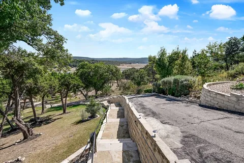 a view of a park with swings and slides