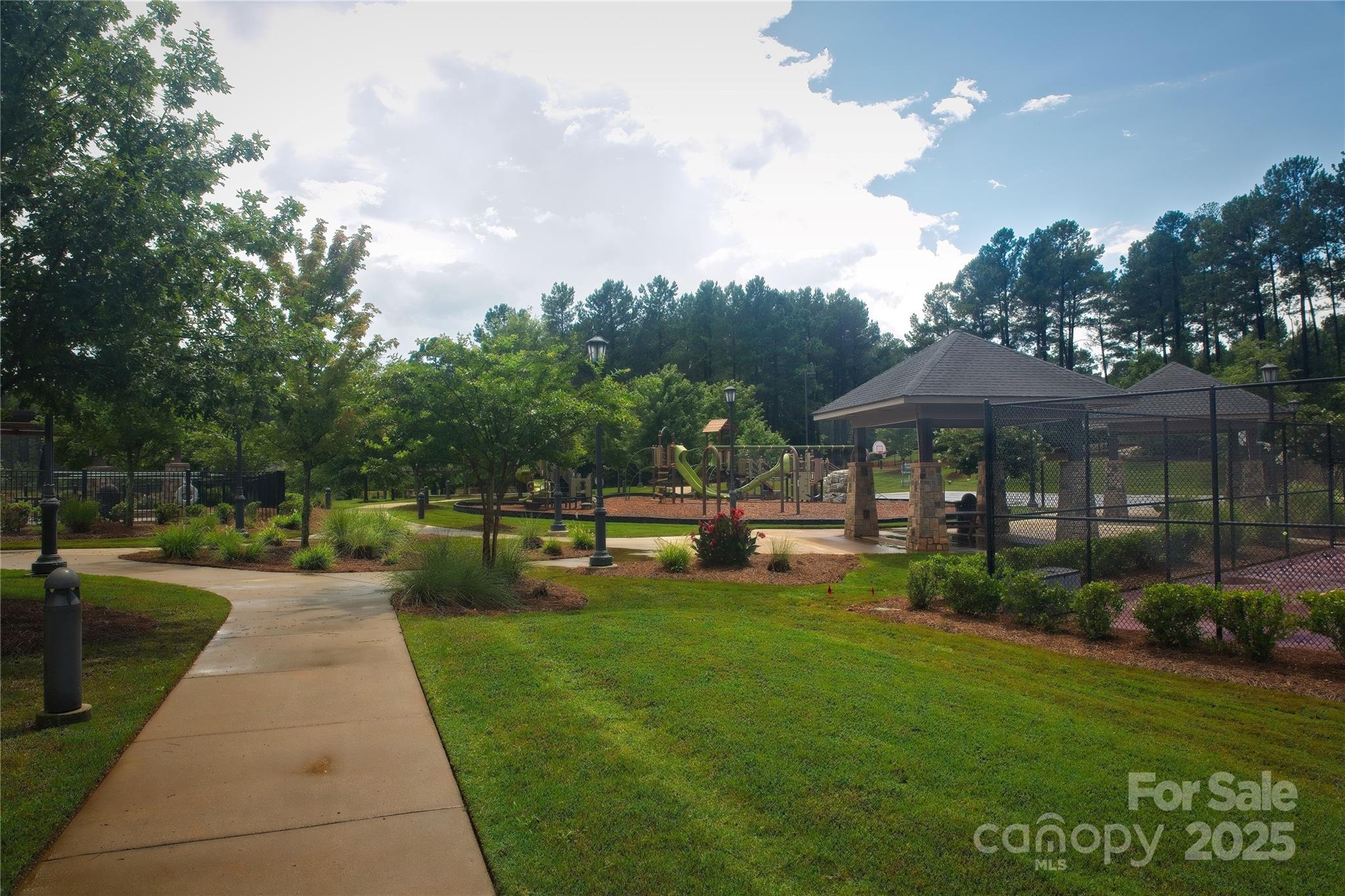 4155 Persimmon Road Lancaster, SC 29720 - Photo 9 of 10 a view of a swimming pool with lounge chairs in a patio