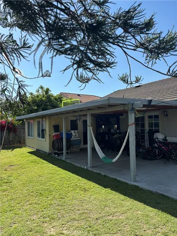 a view of a backyard with plants