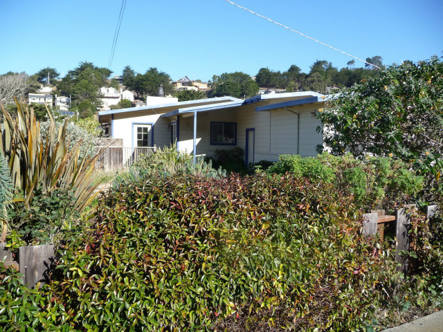 441 Brighton Road Pacifica, CA 94044 - Photo 2 of 18 a view of a house with a garden