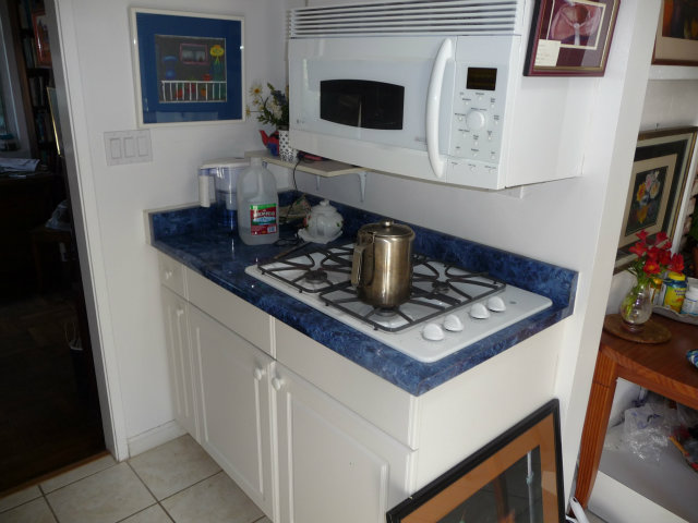 441 Brighton Road Pacifica, CA 94044 - Photo 6 of 18 a kitchen with a stove and a microwave