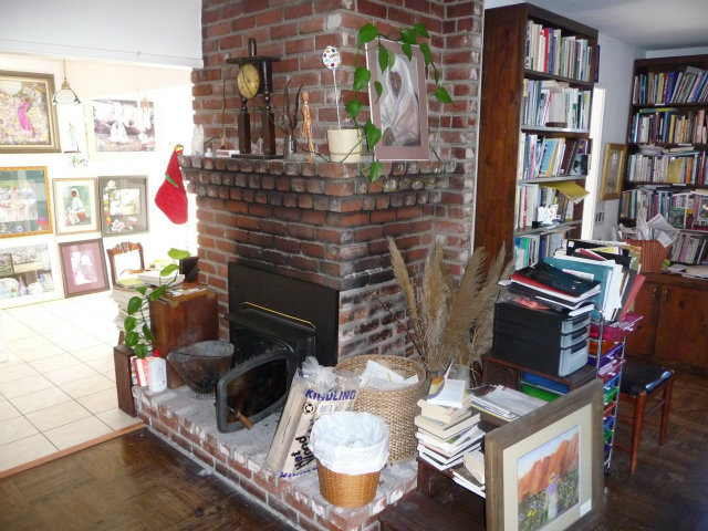 441 Brighton Road Pacifica, CA 94044 - Photo 9 of 18 a living room with furniture and a fireplace