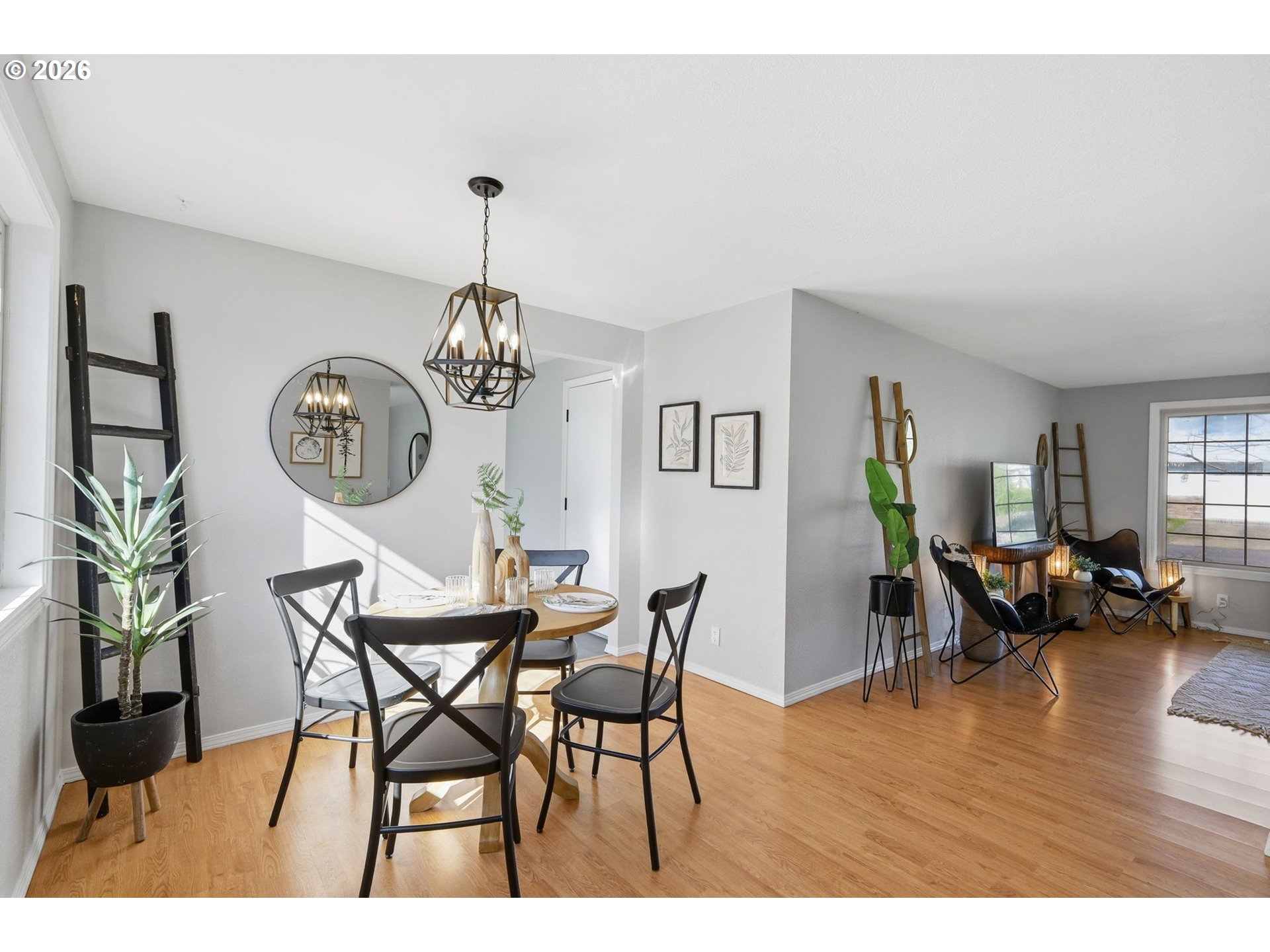 1467 South 7th Street Cottage Grove, OR 97424 - Photo 11 of 48 a view of a dining room with furniture window and wooden floor