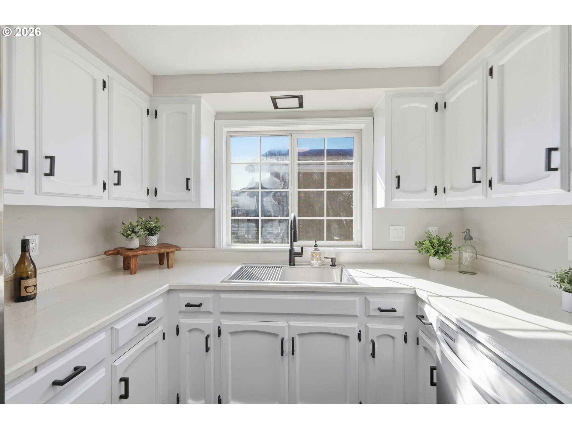 1467 South 7th Street Cottage Grove, OR 97424 - Photo 17 of 48 a kitchen with a sink cabinets and window