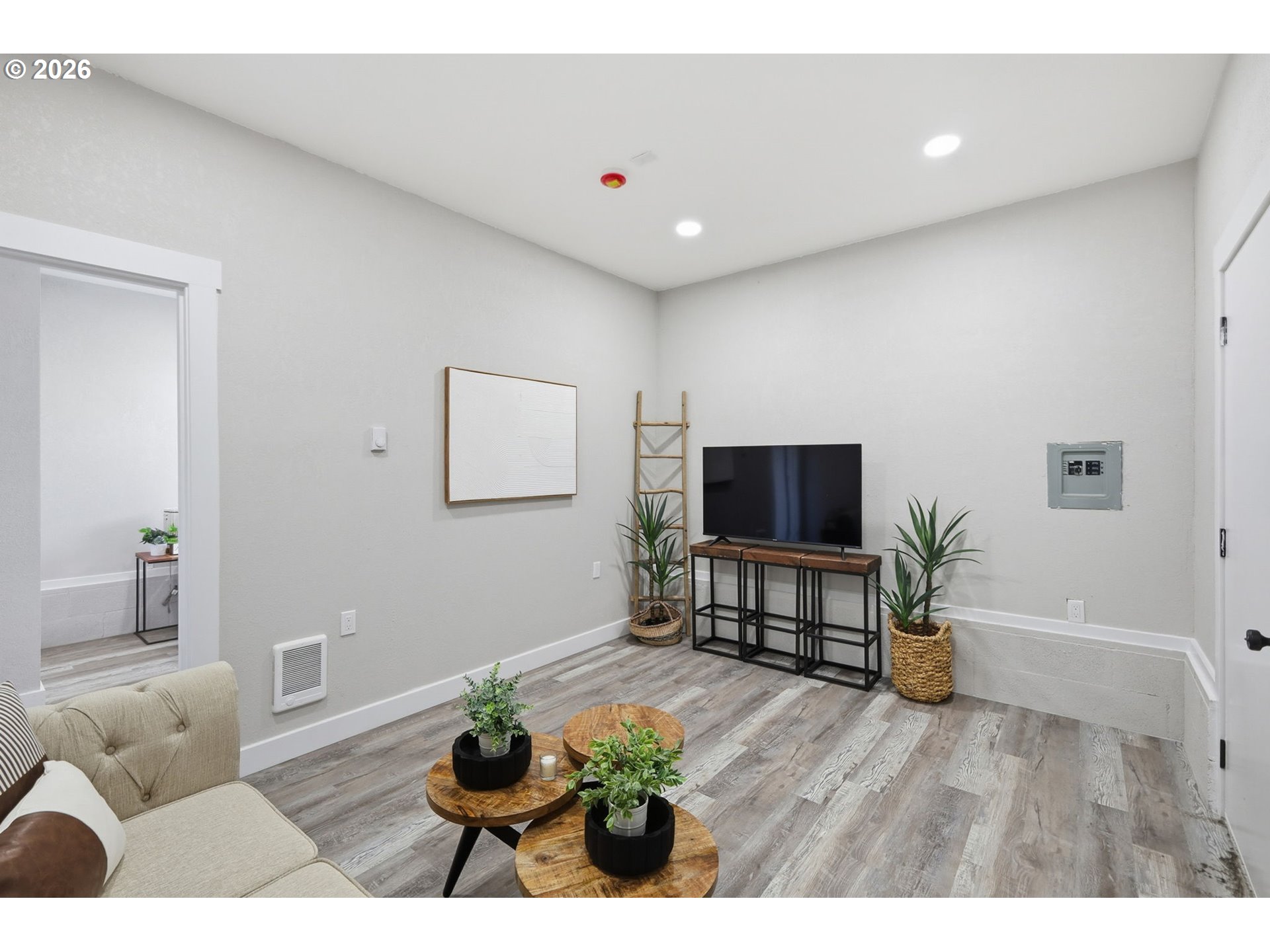 1467 South 7th Street Cottage Grove, OR 97424 - Photo 24 of 48 a living room with furniture and a flat screen tv