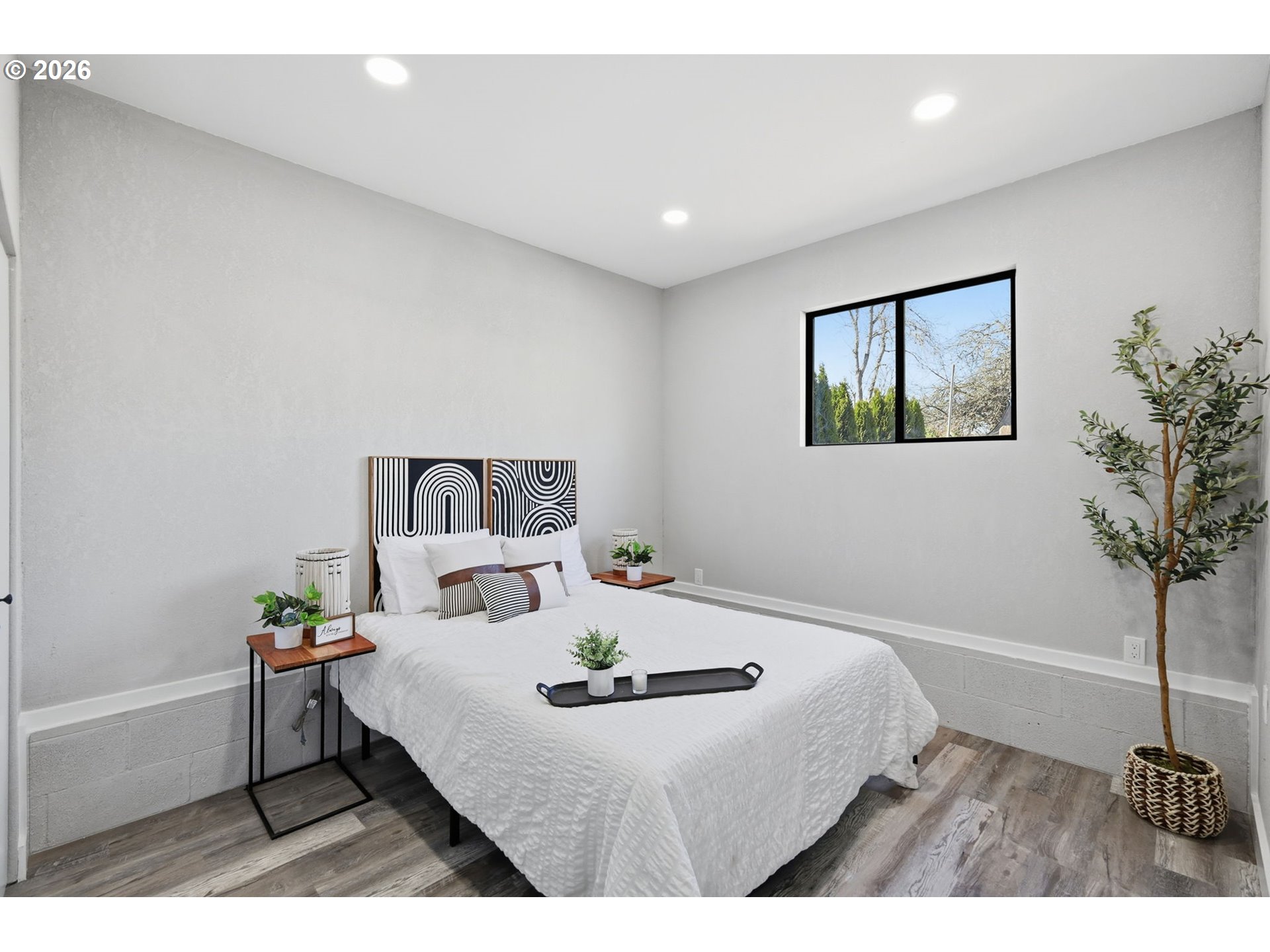 1467 South 7th Street Cottage Grove, OR 97424 - Photo 26 of 48 a bedroom with a bed and a table in it