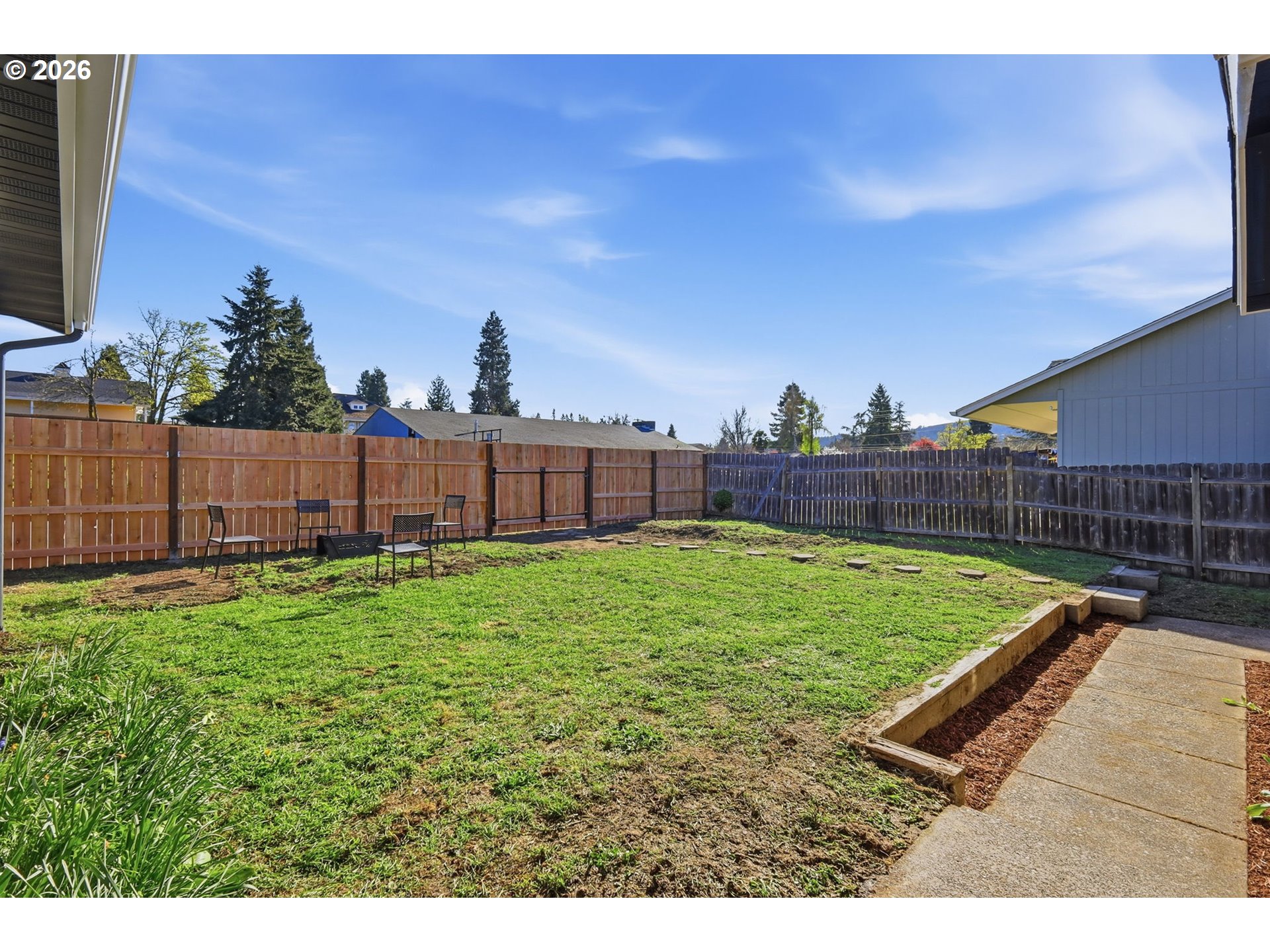 1467 South 7th Street Cottage Grove, OR 97424 - Photo 31 of 48 a view of a backyard