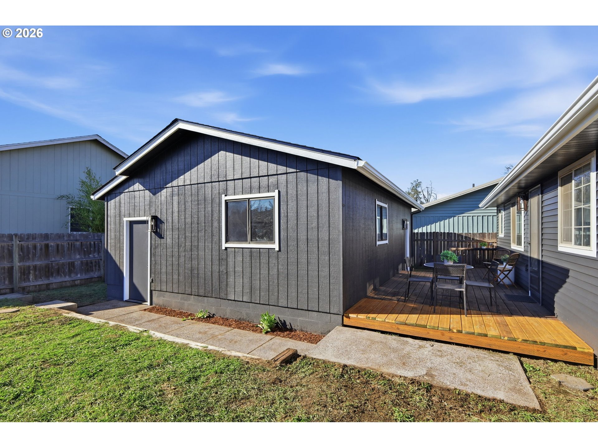 1467 South 7th Street Cottage Grove, OR 97424 - Photo 35 of 48 a house view with a backyard space