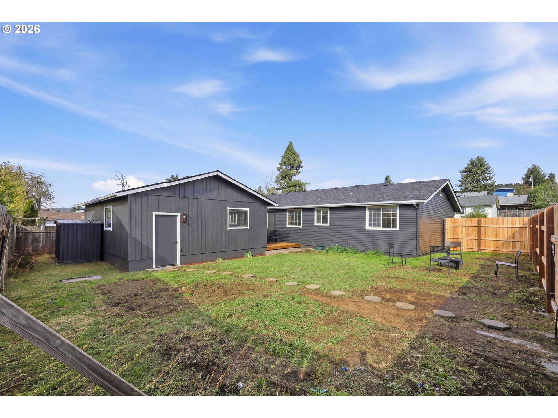 1467 South 7th Street Cottage Grove, OR 97424 - Photo 44 of 48 a view of a house with a yard