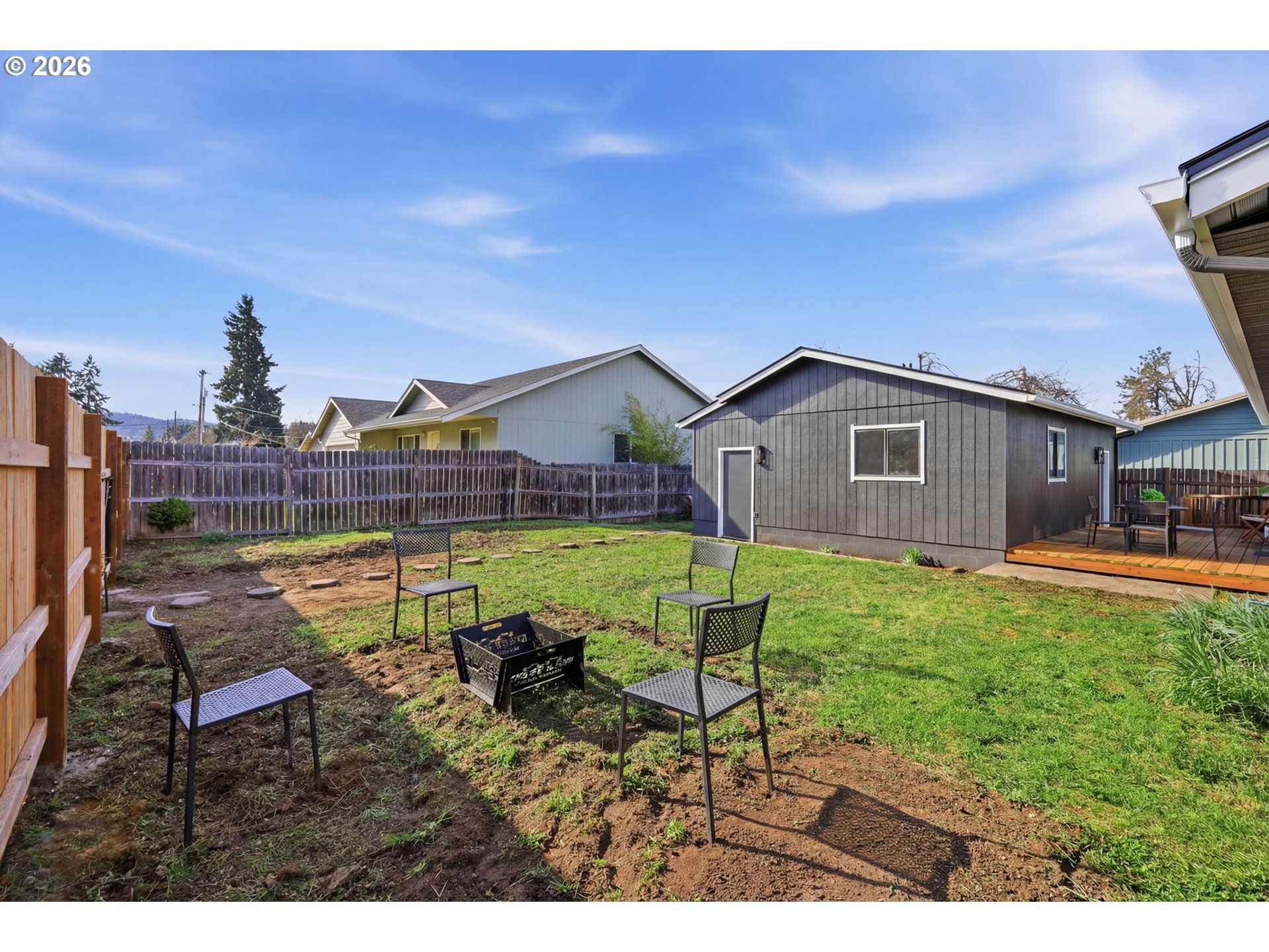 1467 South 7th Street Cottage Grove, OR 97424 - Photo 45 of 48 a view of a house with backyard