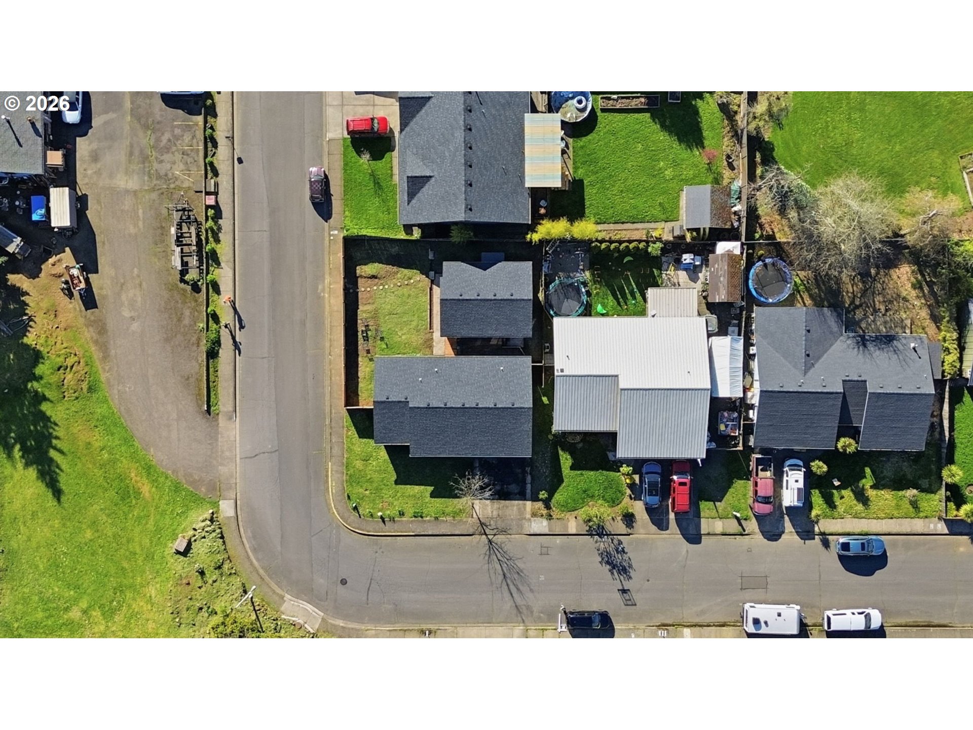 1467 South 7th Street Cottage Grove, OR 97424 - Photo 48 of 48 an aerial view of houses with outdoor space