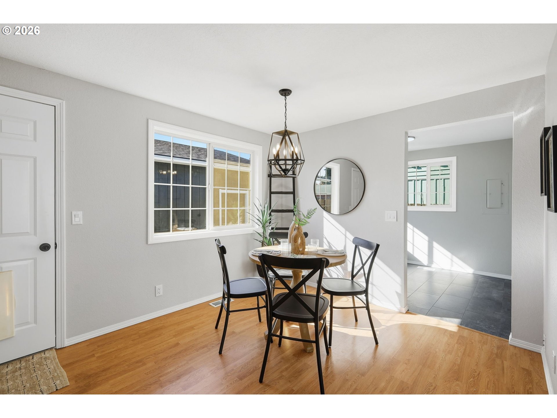 1467 South 7th Street Cottage Grove, OR 97424 - Photo 9 of 48 a view of a dining room with furniture and a window