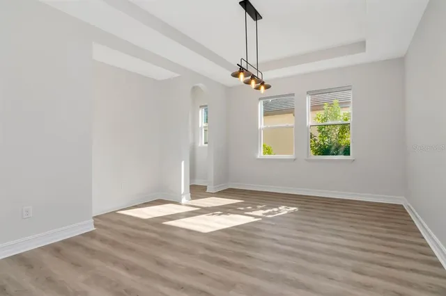a view of entryway with wooden floor