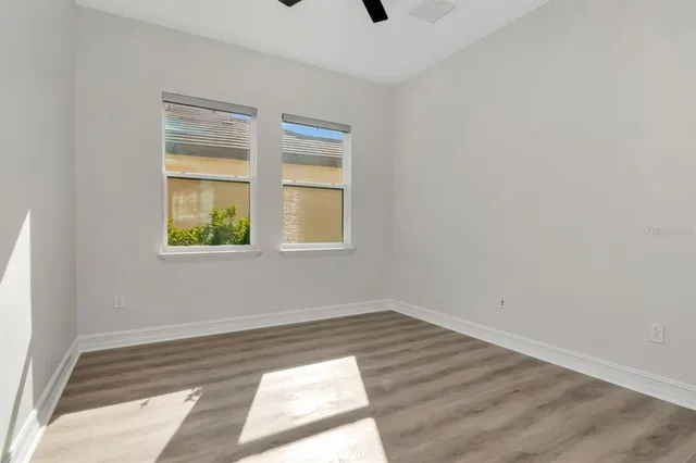 a view of a hallway with stairs