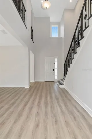 a view of a kitchen with a sink and a window