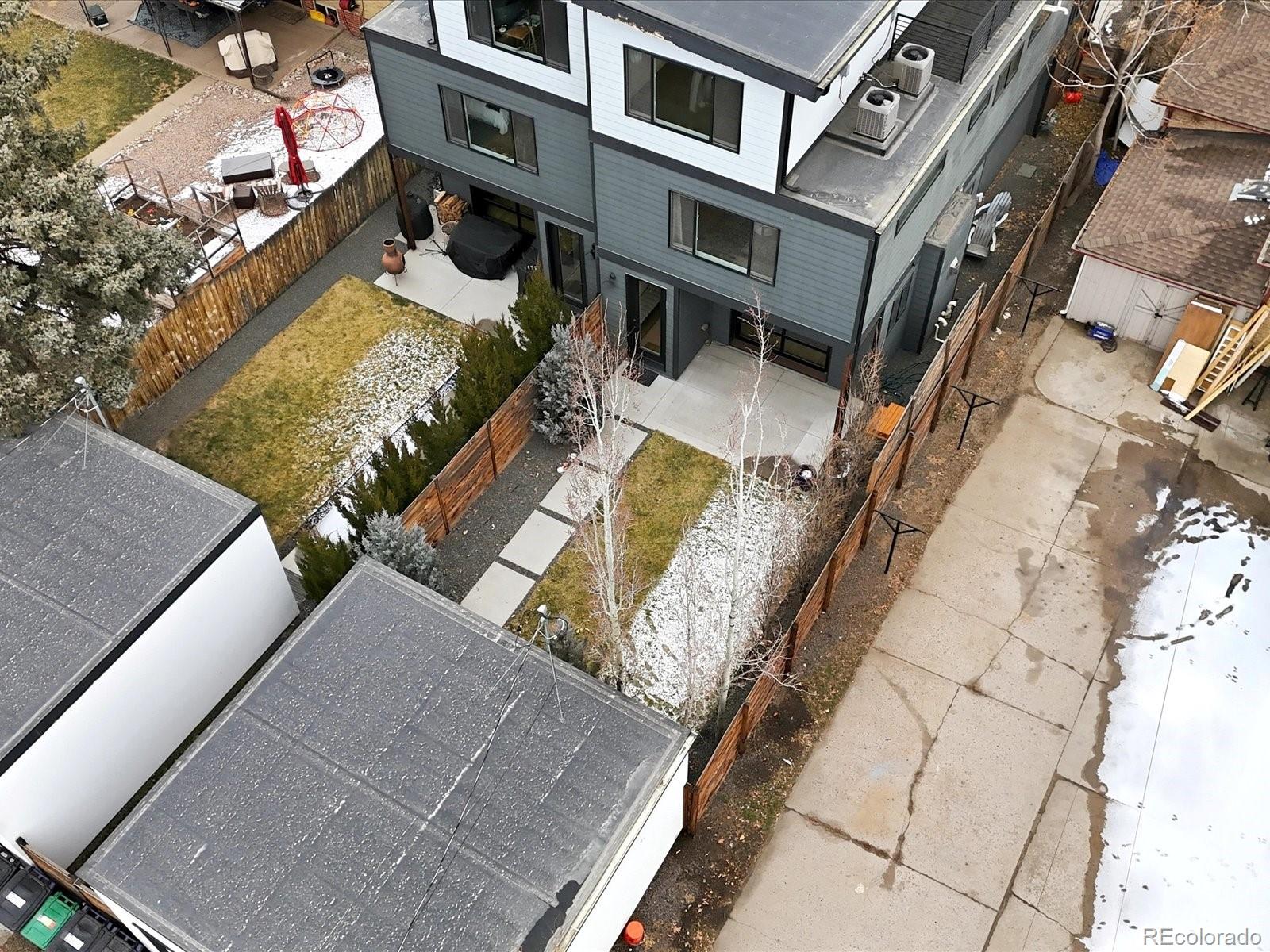 4141 Shoshone Street Denver, CO 80211 - Photo 46 of 50 an aerial view of residential houses with outdoor space