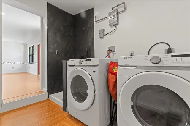 a utility room with dryer and washer
