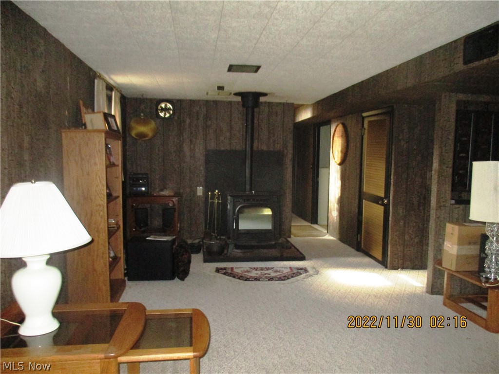 3729 Bassett Road Rootstown, OH 44272 - Photo 25 of 25 Large family room with wood burner.