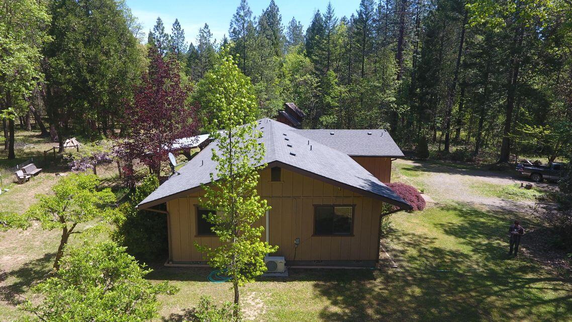 922 Garner Road Cave Junction, OR 97523 - Photo 4 of 24 an aerial view of a house