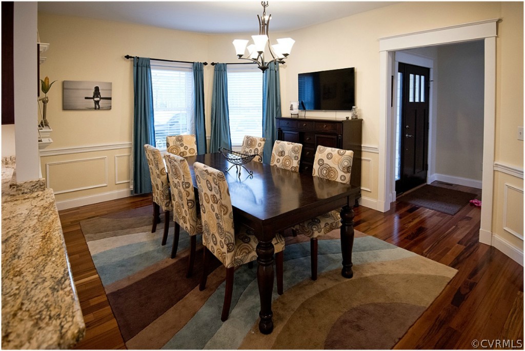 3822 Baldwin Road Chester, VA 23831 - Photo 8 of 22 a view of a dining room with furniture window and wooden floor