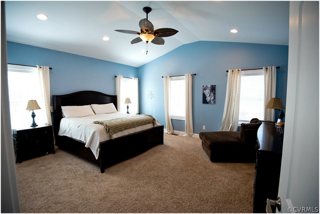 3822 Baldwin Road Chester, VA 23831 - Photo 9 of 22 a bedroom with a bed and a chandelier
