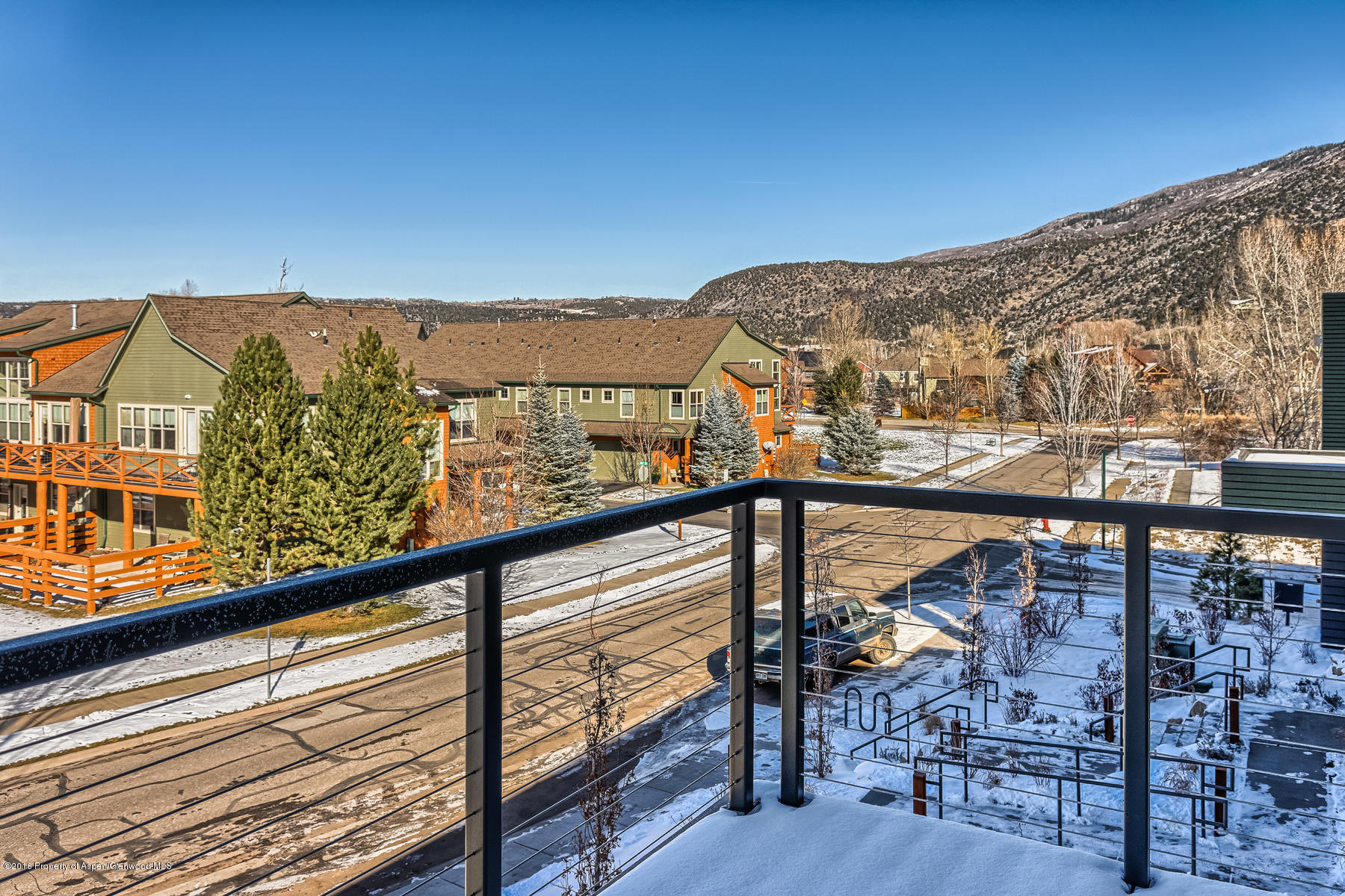 104 Evans Road, Unit 107 Basalt, CO 81621 - Photo 15 of 23 a view of a balcony with an ocean view