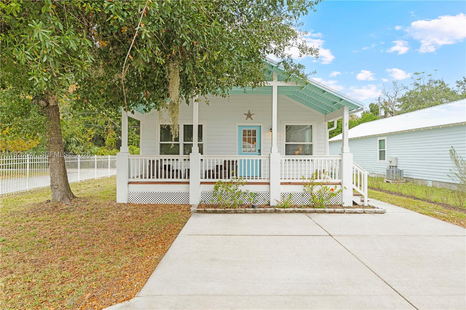 2 Poinciana Cove Road St. Augustine, FL 32084 - Photo 2 of 43 a view of house with outdoor seating