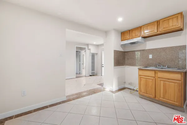 a view of a kitchen with a sink