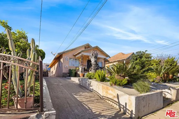 a view of a house with a garden