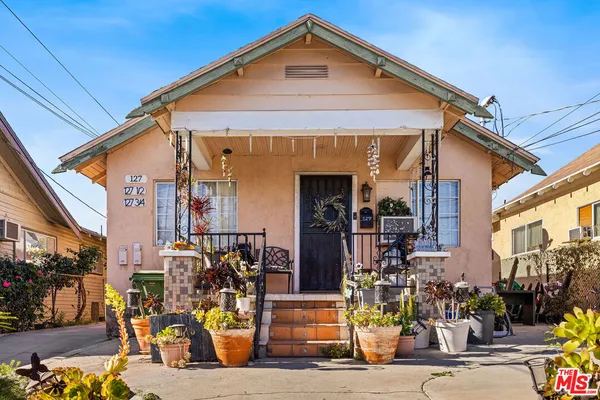 a front view of a house with outdoor