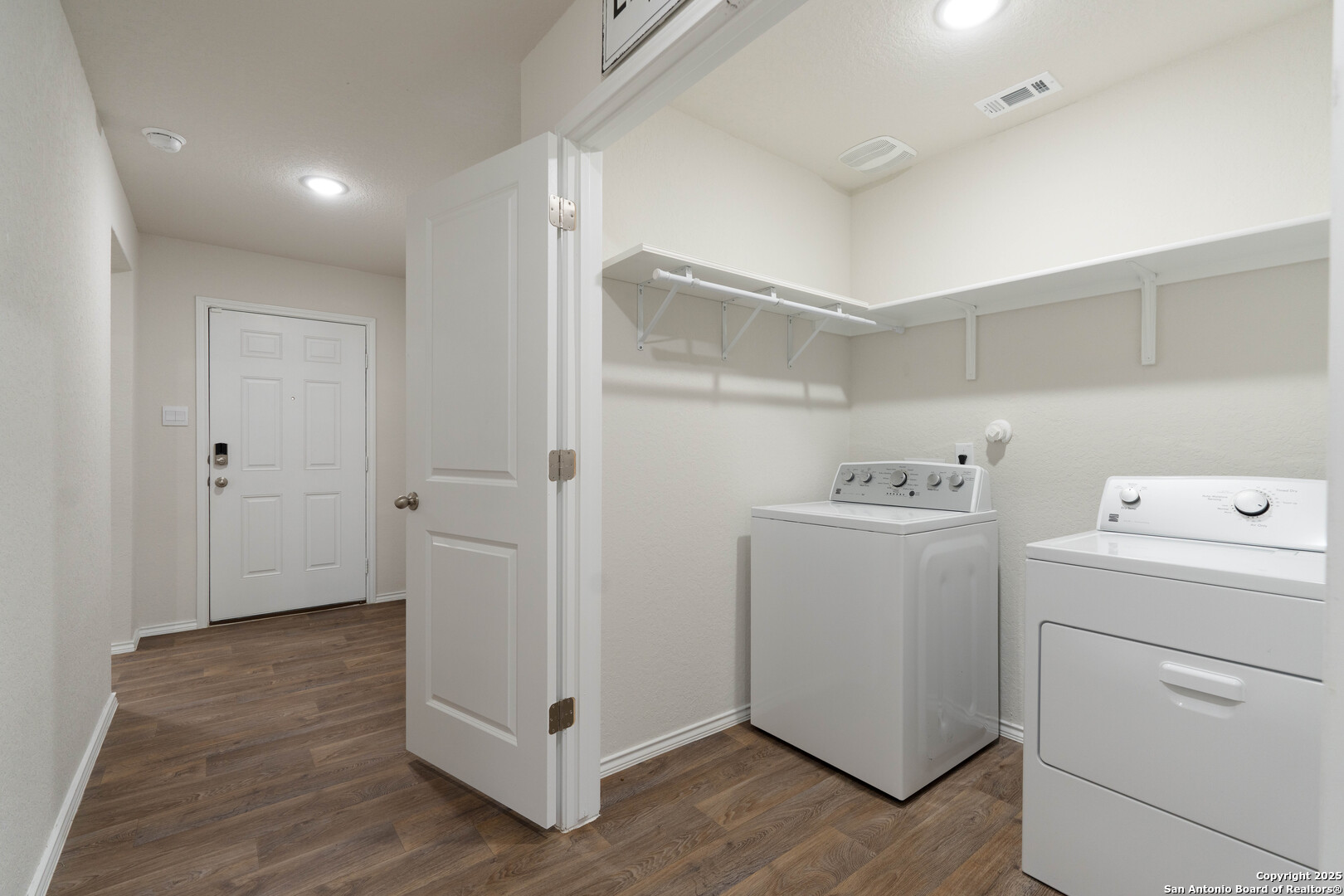 6806 Rondo Measure San Antonio, TX 78252 - Photo 22 of 25 a view of utility room with washer and dryer