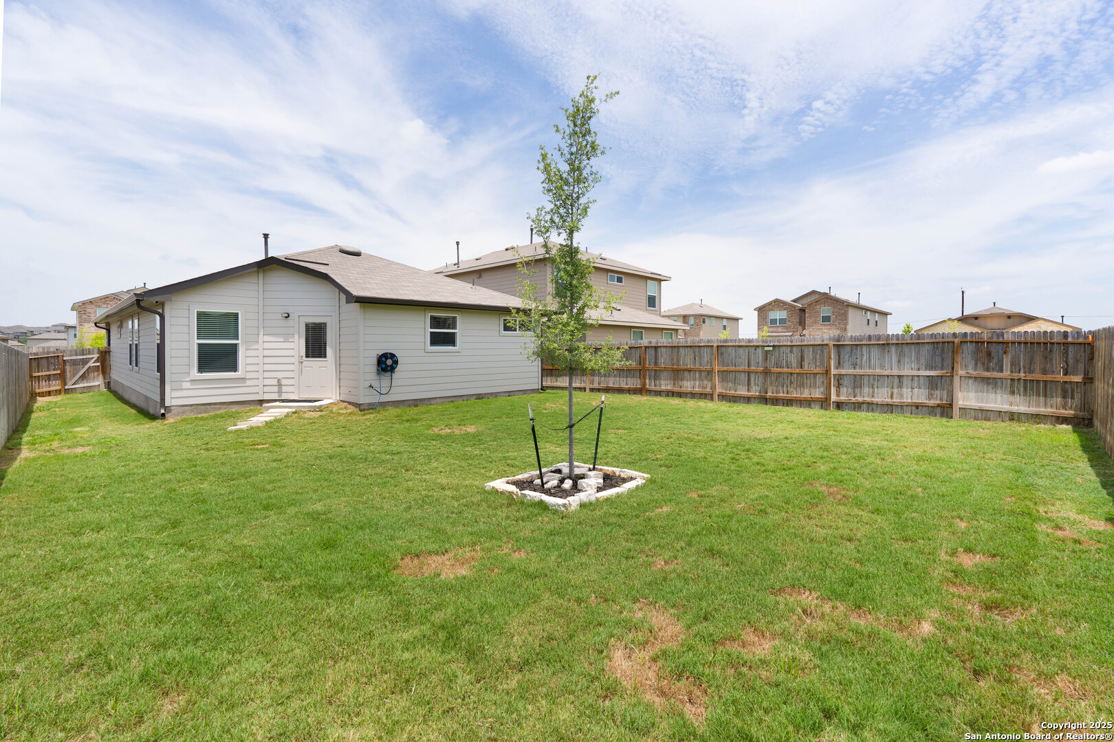 6806 Rondo Measure San Antonio, TX 78252 - Photo 24 of 25 a big room with yard and entertaining space