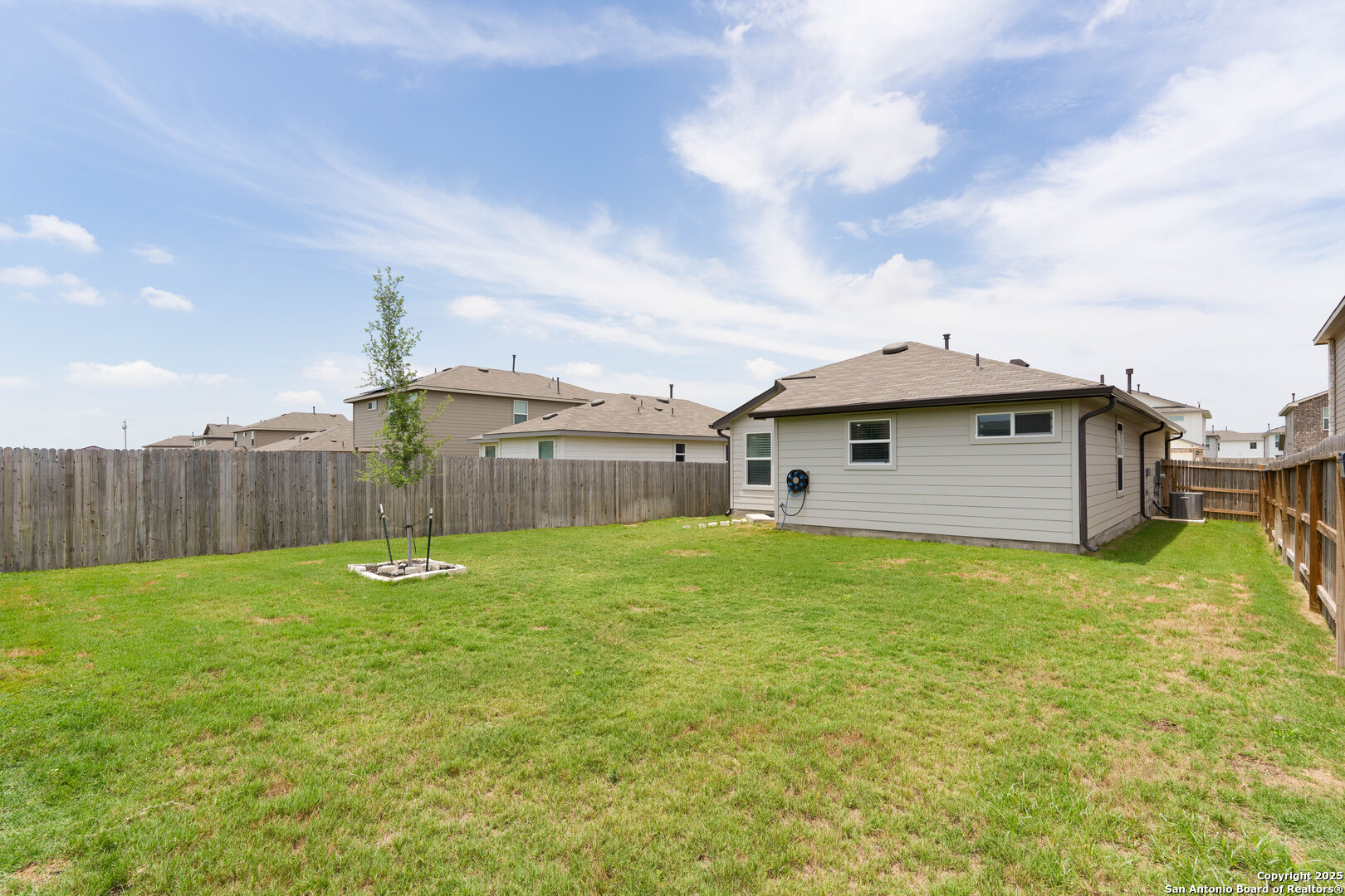6806 Rondo Measure San Antonio, TX 78252 - Photo 25 of 25 a backyard of a house
