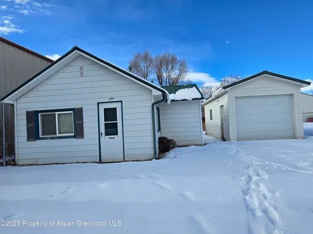 a view of a house with a garage
