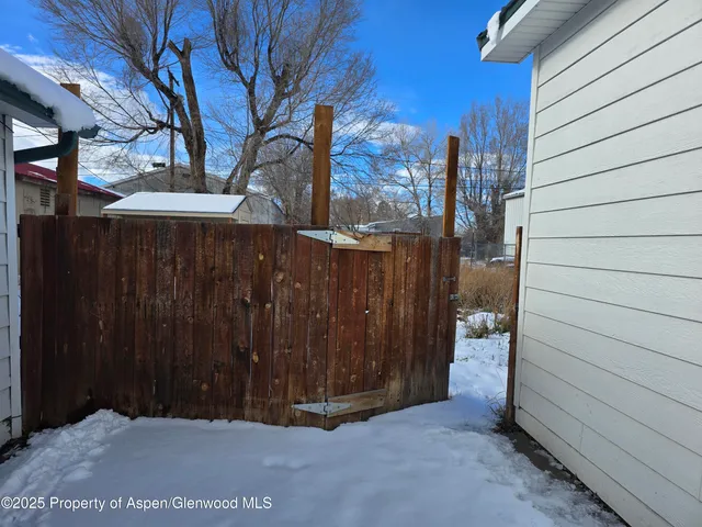 a view of backyard with green space