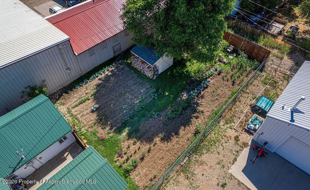 354 School Street Craig, CO 81625 - Photo 26 of 26 a view of a backyard with a house