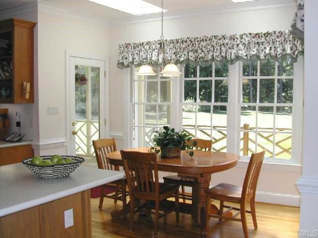 10309 Roadstead Way West Raleigh, NC 27613 - Photo 6 of 12 Breakfast Nook w/Skylites Opens to Screen Porch