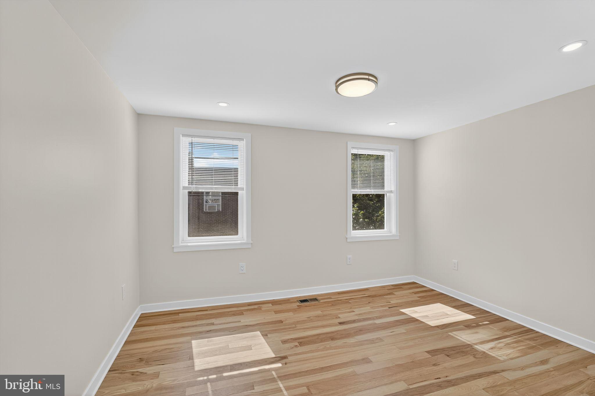615 Sigel Street Philadelphia, PA 19148 - Photo 21 of 28 a view of empty room with wooden floor and fan