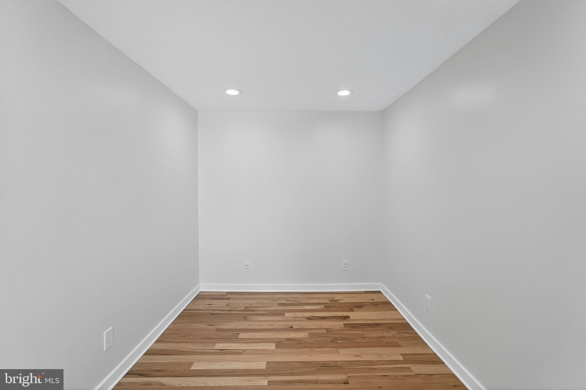 615 Sigel Street Philadelphia, PA 19148 - Photo 22 of 28 a view of a room with wooden floor and white walls