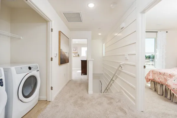 a view of washer and dryer in a utility room