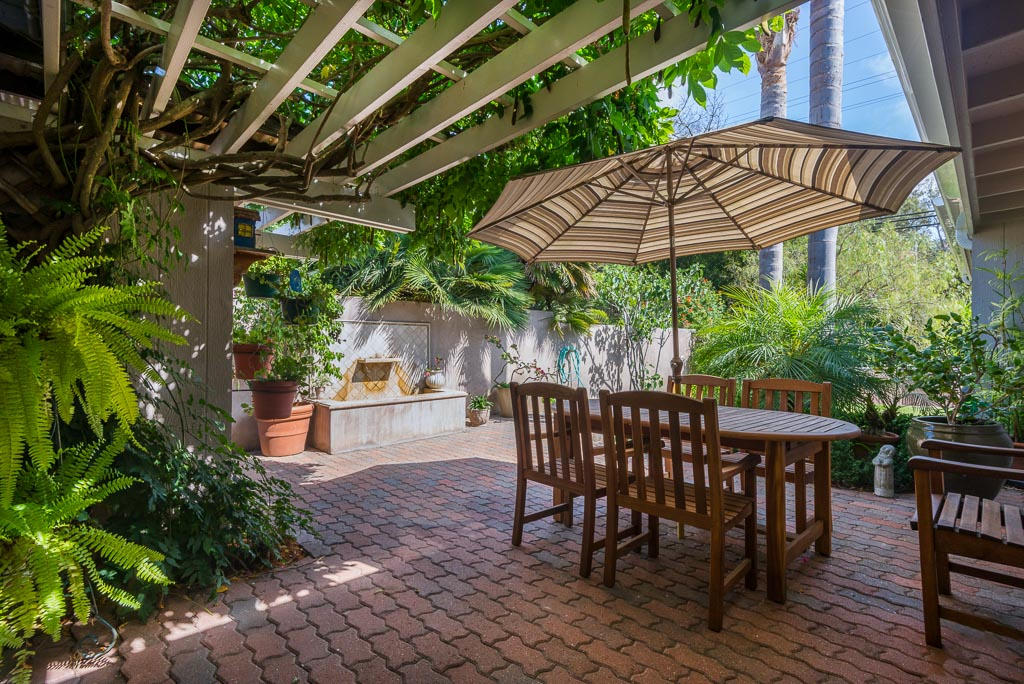 2123 Sycamore Canyon Road Santa Barbara, CA 93108 - Photo 13 of 15 a patio with a patio table and chairs