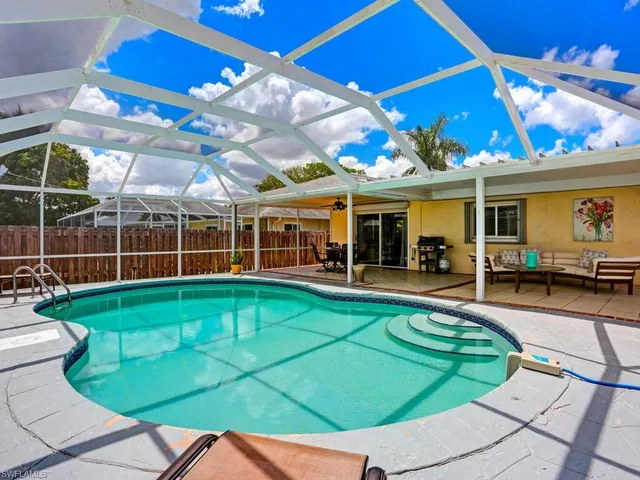 a view of a chairs and tables in the patio