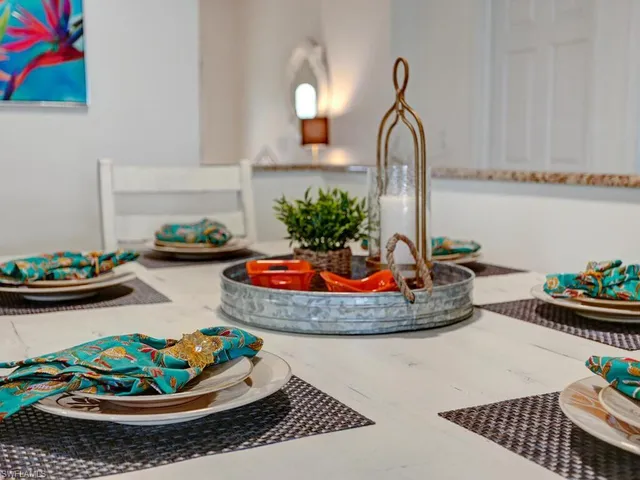 a view of a dining room with furniture